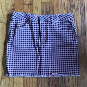 Pink and black checkered skirt